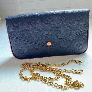 Louis Vuitton clutch / cross body.